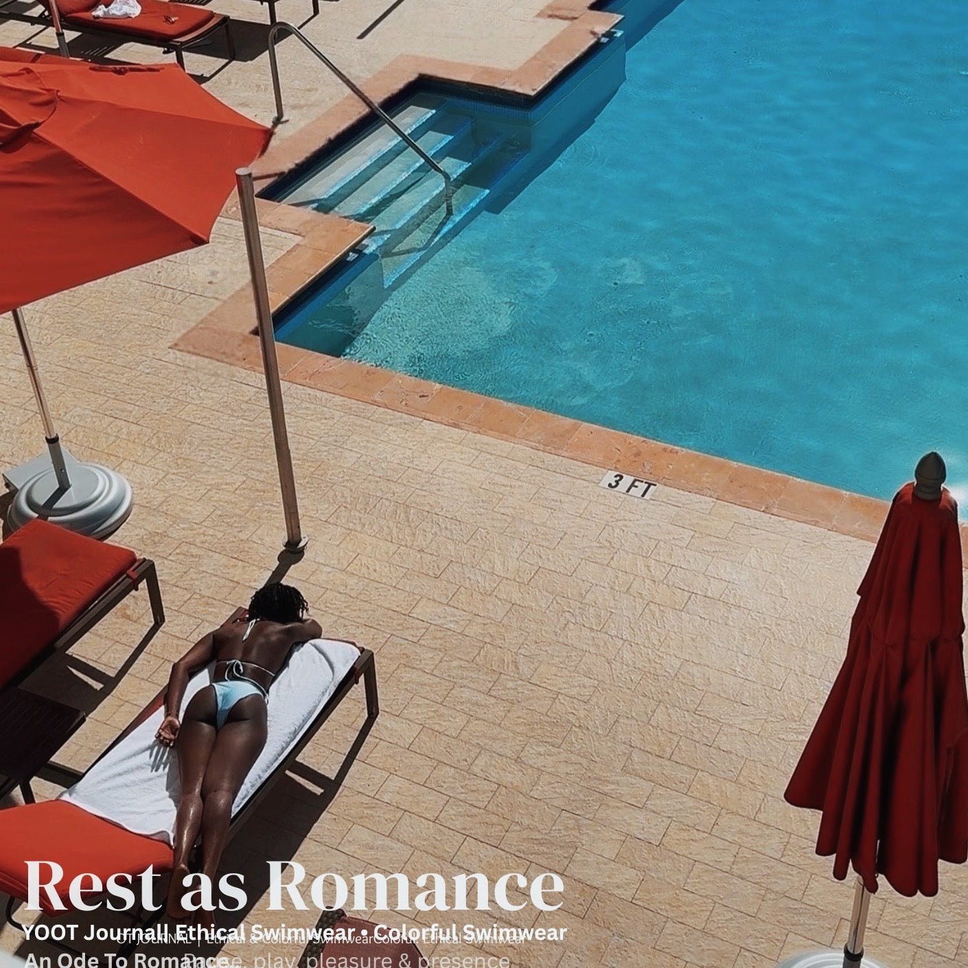 Woman resting poolside on a lounge chair beside blue water and red umbrellas, embodying rest, romance, and ethical colorful swimwear.